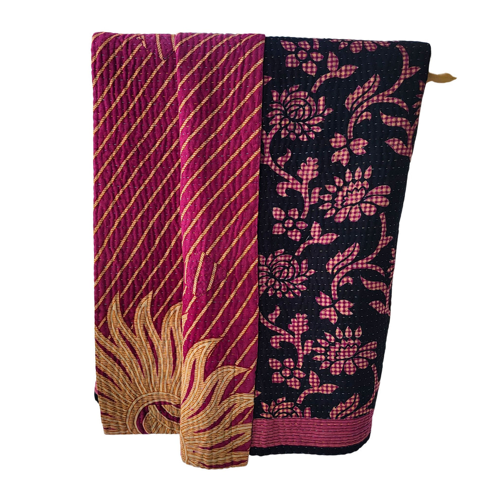 Basha throw blanket in bougainvillea magenta and black