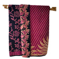 Basha throw blanket in bougainvillea magenta and black