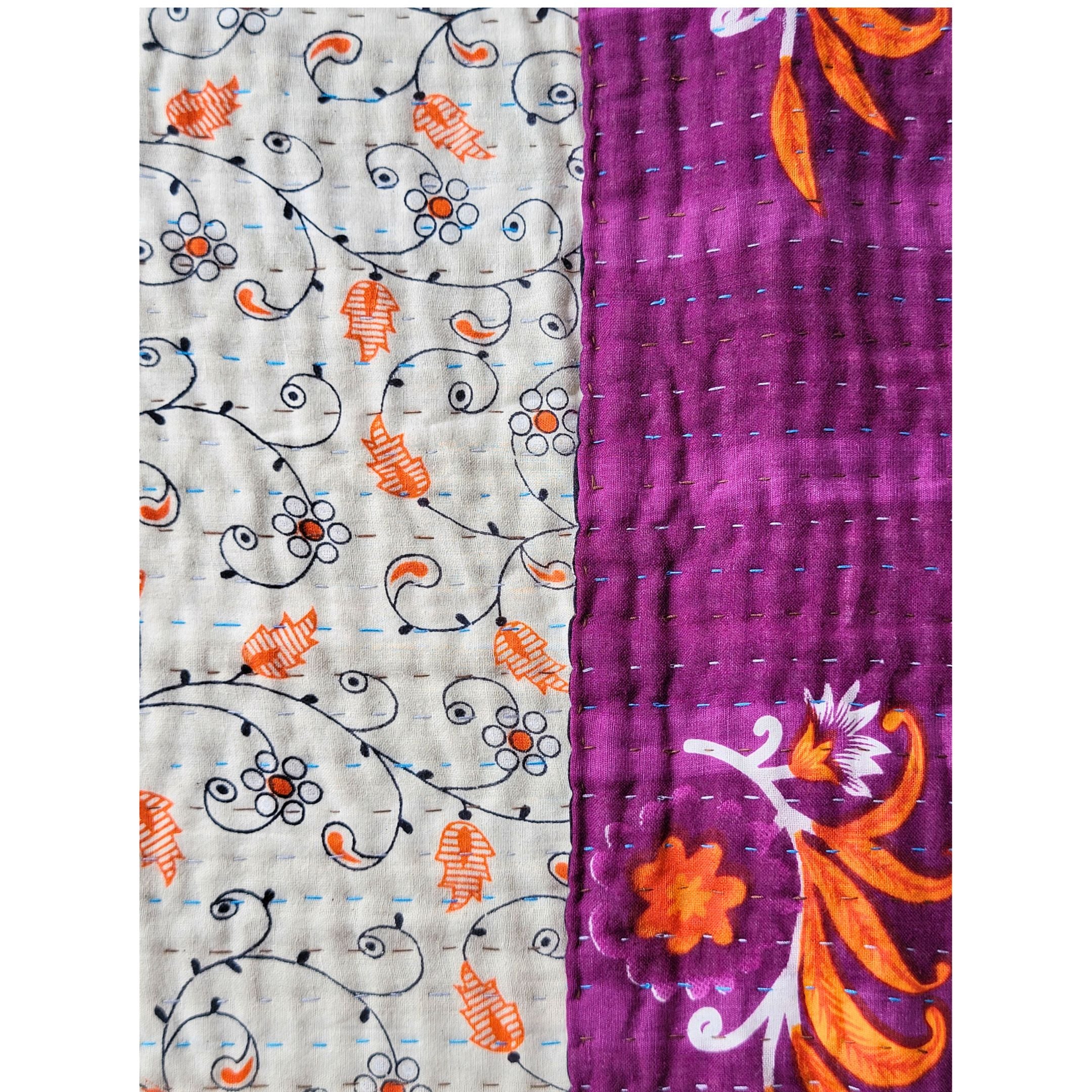 Basha throw blanket in white and purple
