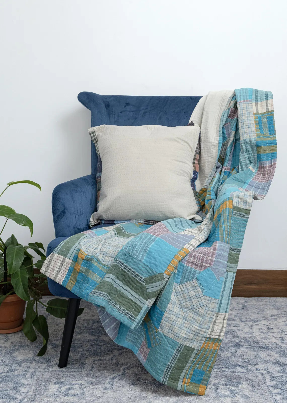 Basha Throw Blanket in Recycled Plaid with Unbleached Cotton Backing