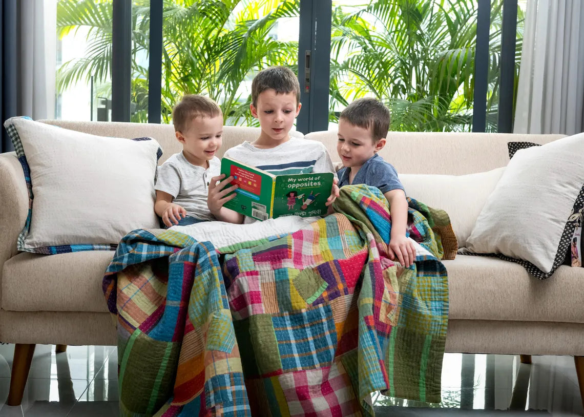 Basha Throw Blanket in Recycled Plaid with Unbleached Cotton Backing