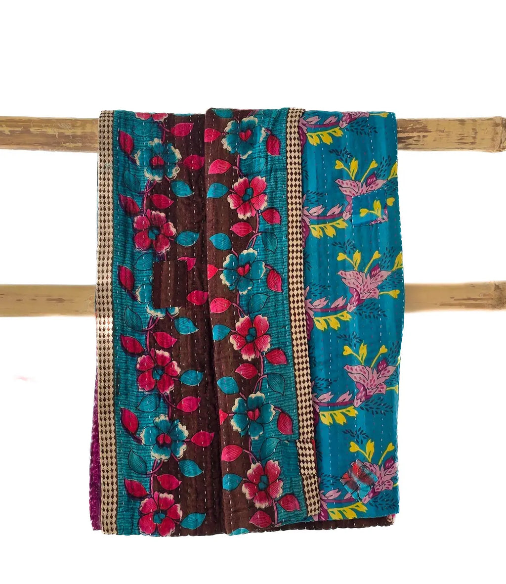 Basha throw blanket in dark brown and blue